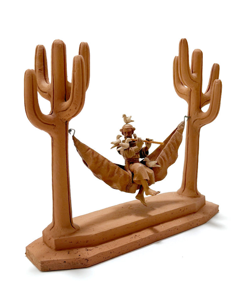 São Francisco na rede c/ pífano e pássaros (cerâmica)