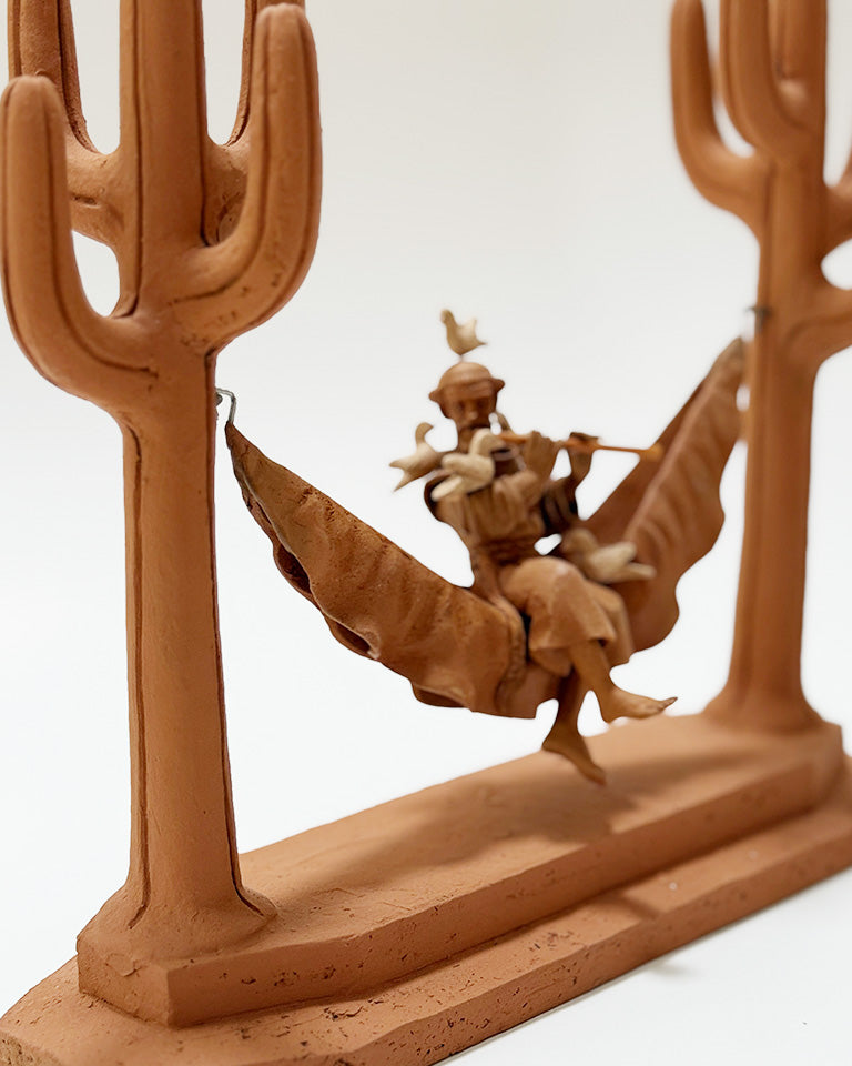 São Francisco na rede c/ pífano e pássaros (cerâmica)