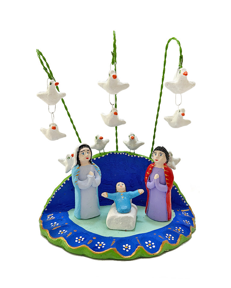 Presépio azul com aves brancas