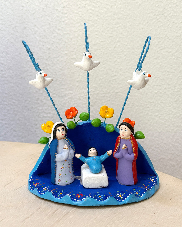 Presépio azul (flores brancas e flores amarelas e laranjas)