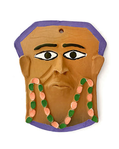Máscara em cerâmica (roxa, rosa e verde)